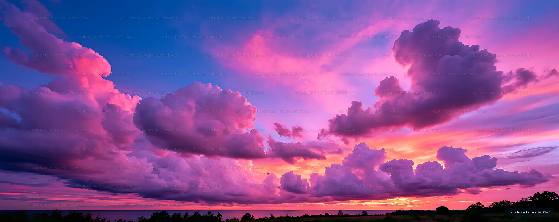 Colorful storm clouds and sunset over a coastal horizon