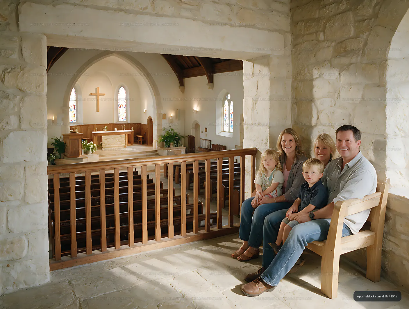 Family of five seated in a church