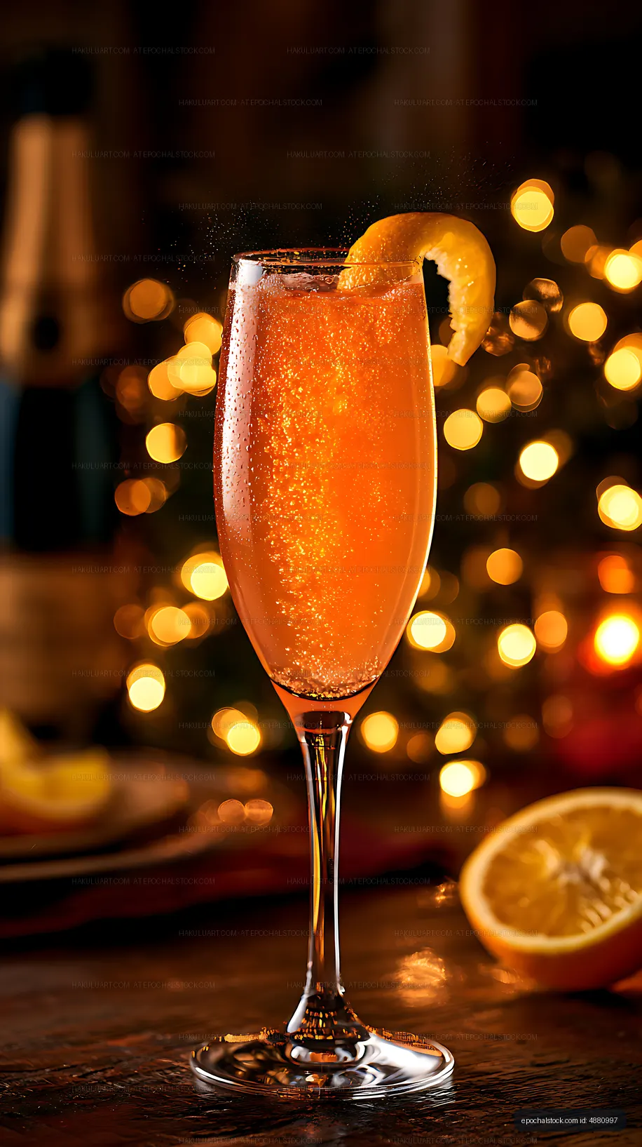 Close-up sparkling orange beverage with citrus garnish