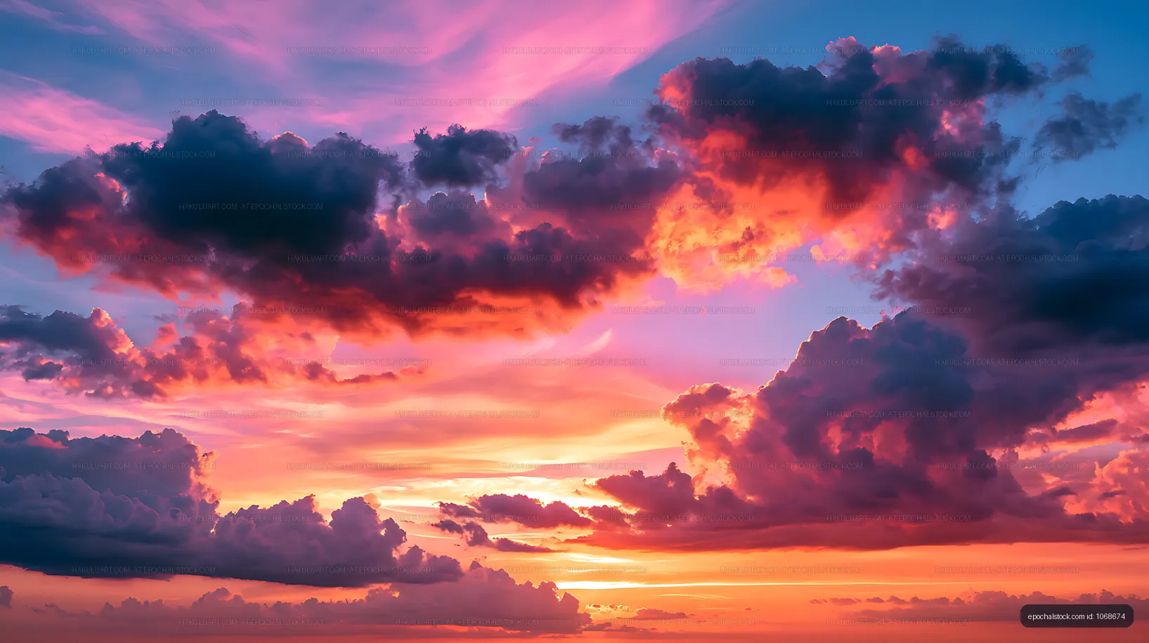Colorful sunset sky filled with dramatic billowing clouds