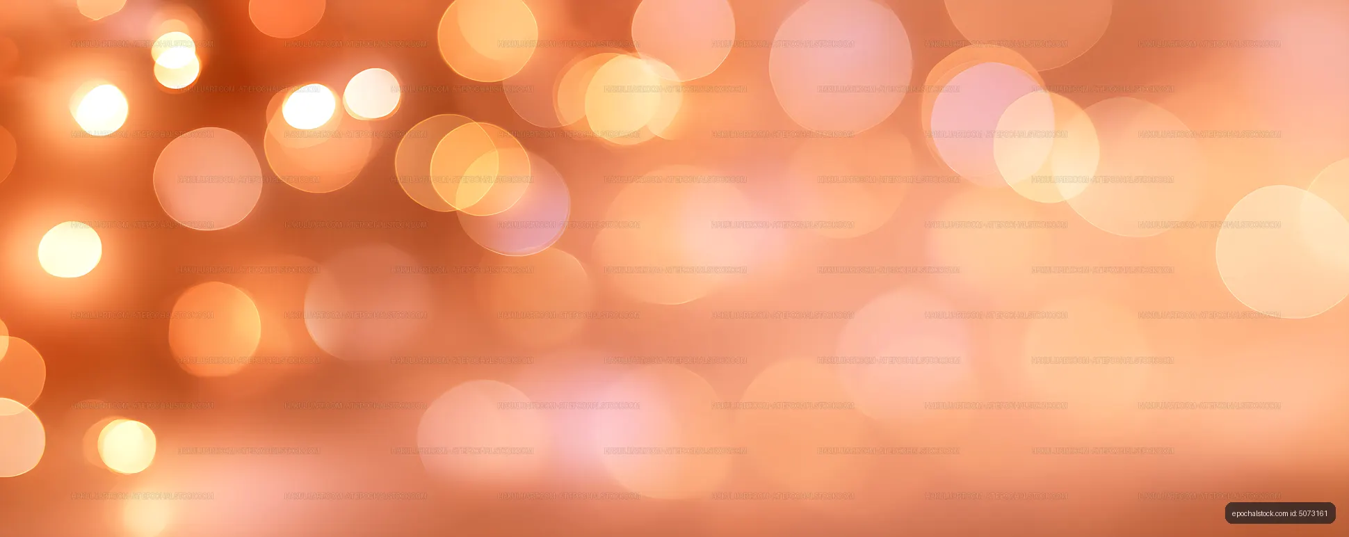Soft glowing orange bokeh backdrop