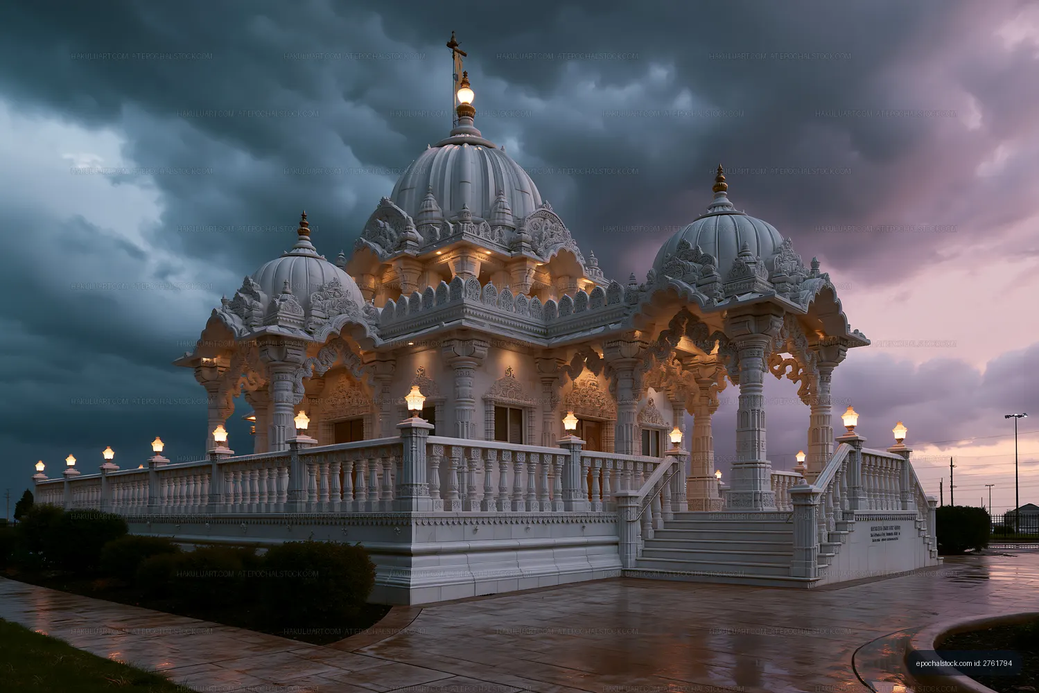 Illuminated ornate temple after rain beneath dark clouds