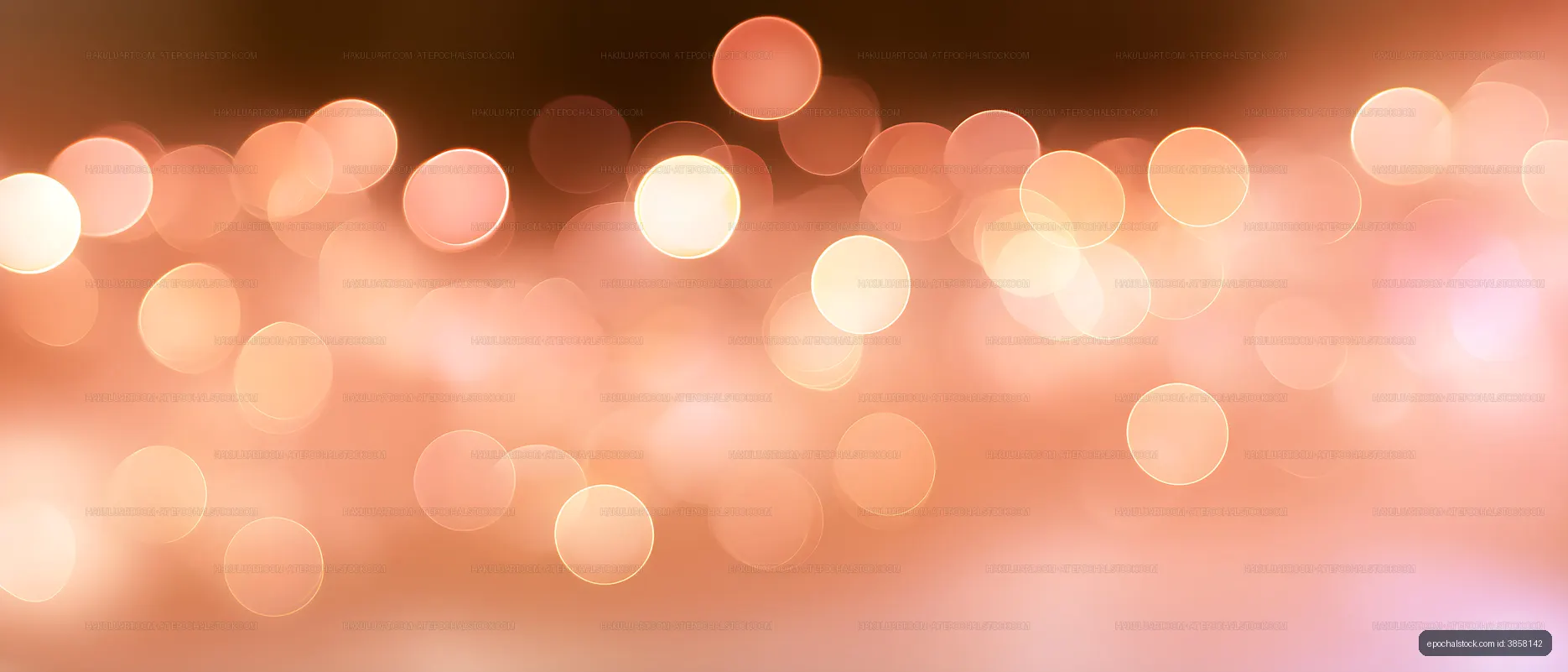 Abstract peach and coral glowing bokeh