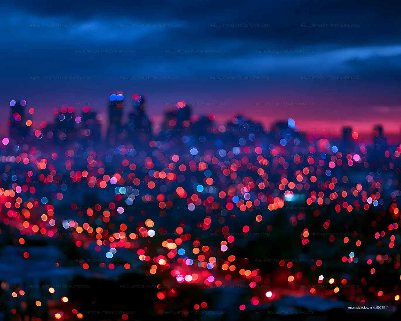 Vibrant blurred city lights beneath a twilight sky