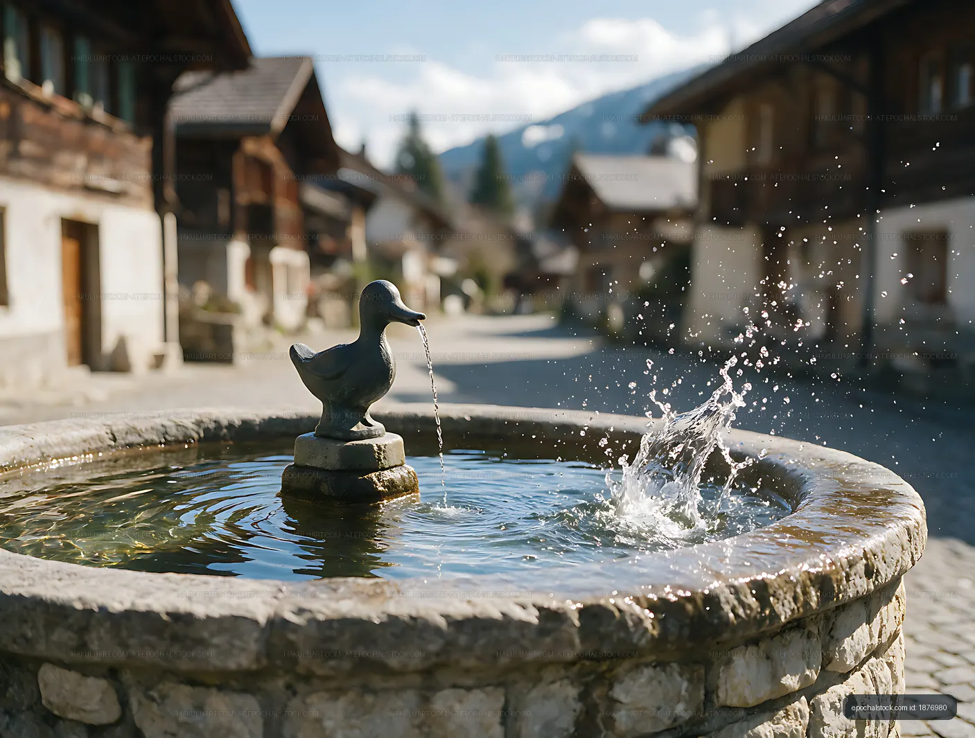 Duck sculpture fountain in a Swiss village
