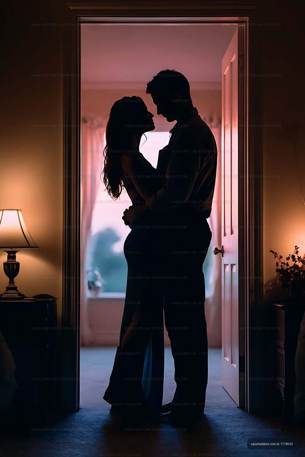 Two people sharing an intimate embrace indoors