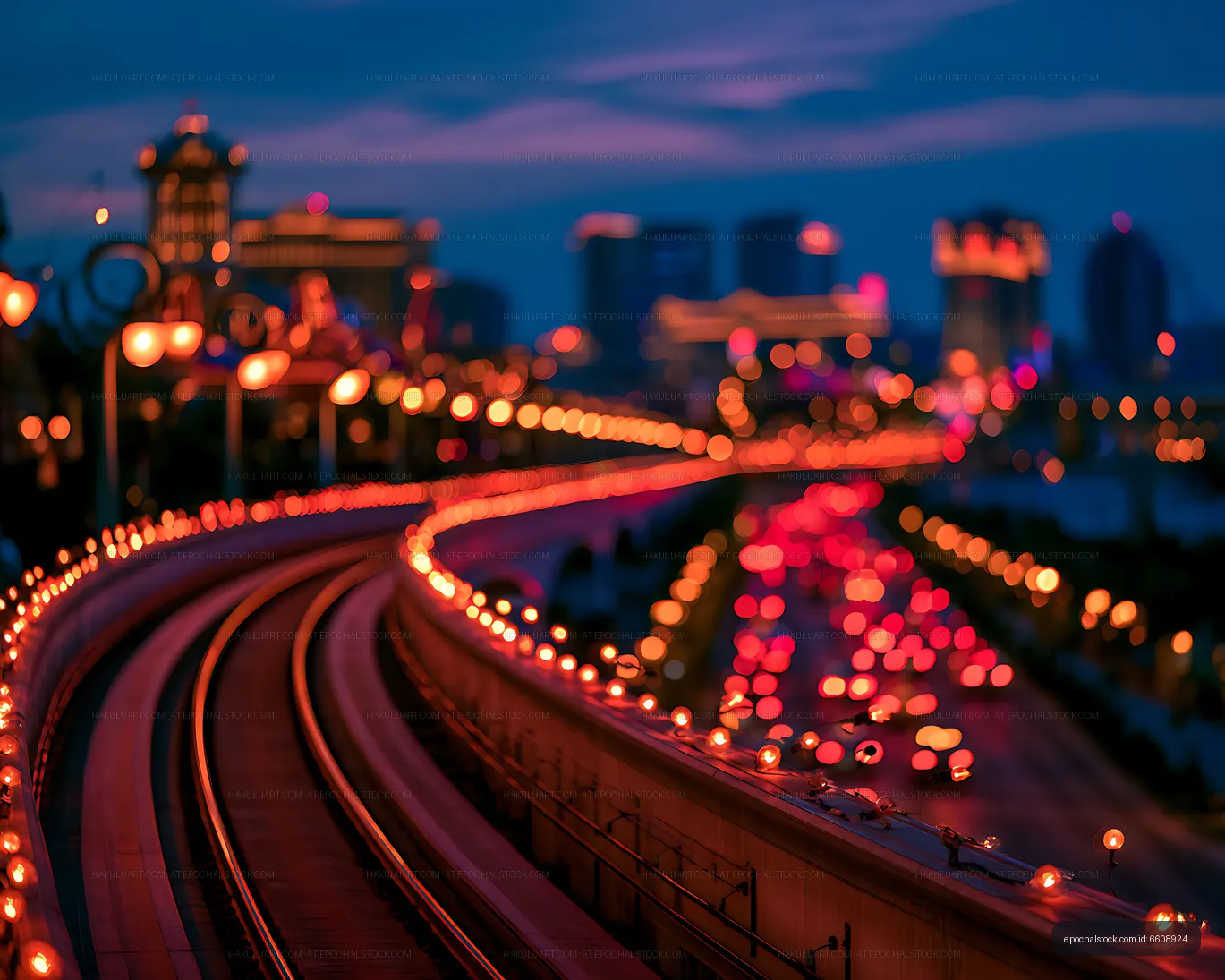 Blurred evening highway with vibrant traffic lights