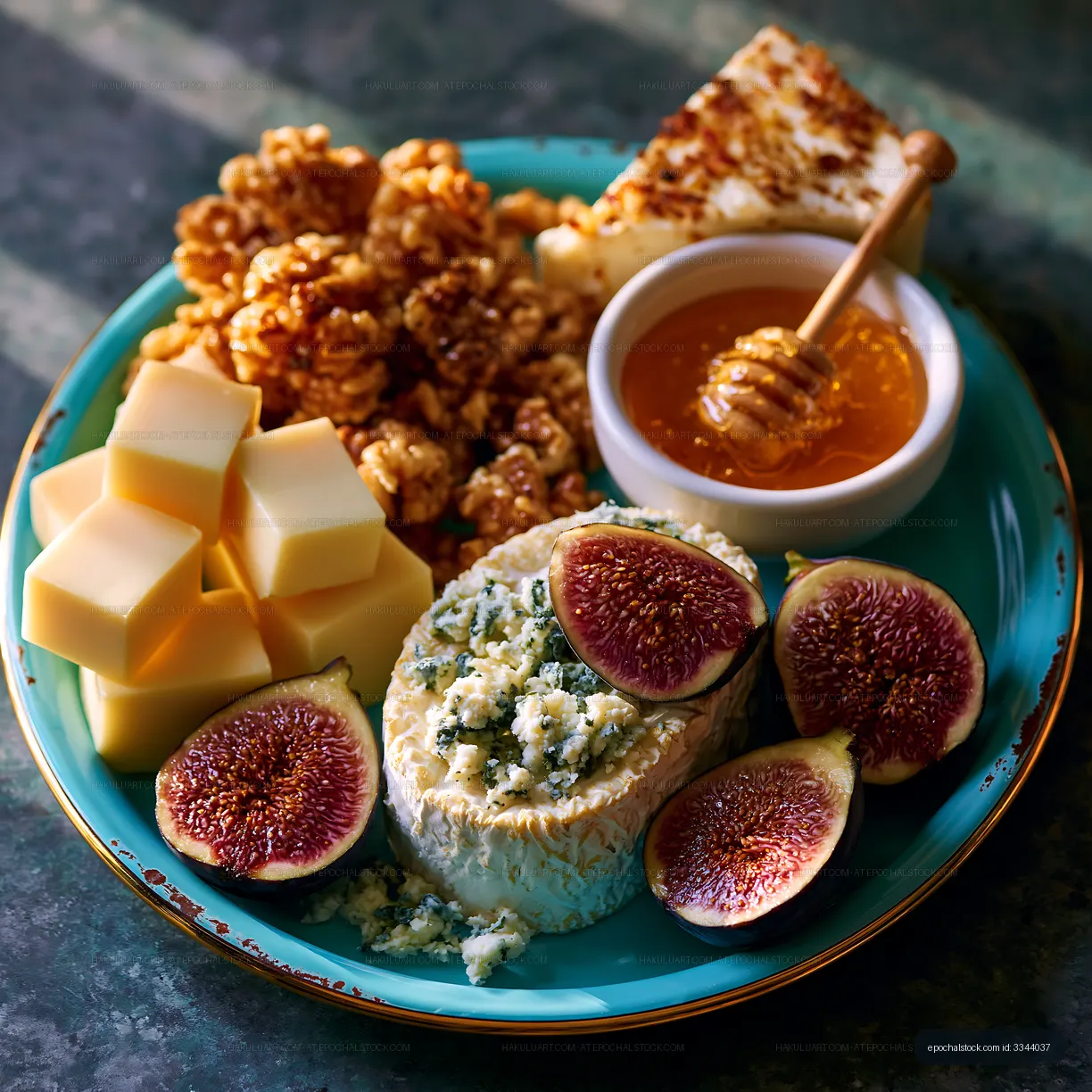 Gourmet cheese platter served with figs and honey