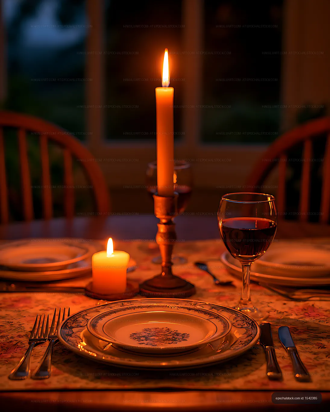 Warm candlelight over an elegant dinner setting