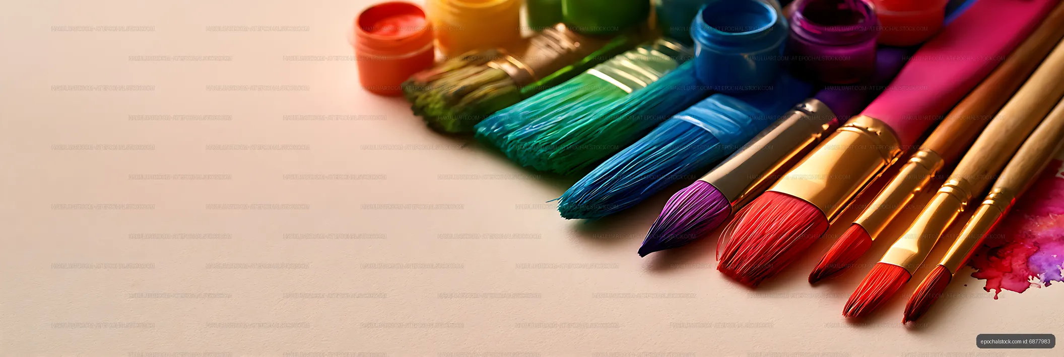 Colorful brushes and paint containers with copy space
