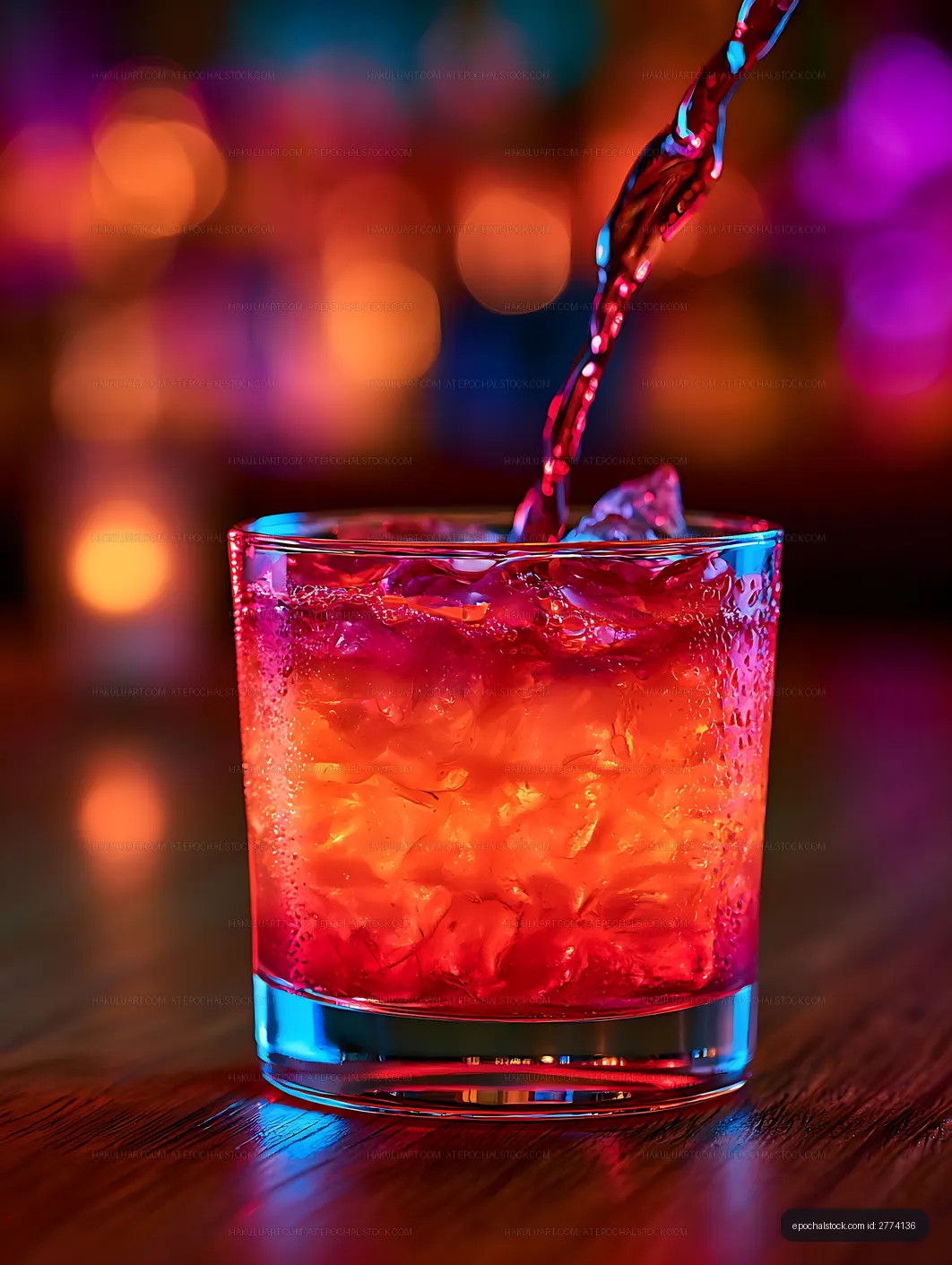 Neon Lit Cocktail with Ice and Liquid Splash