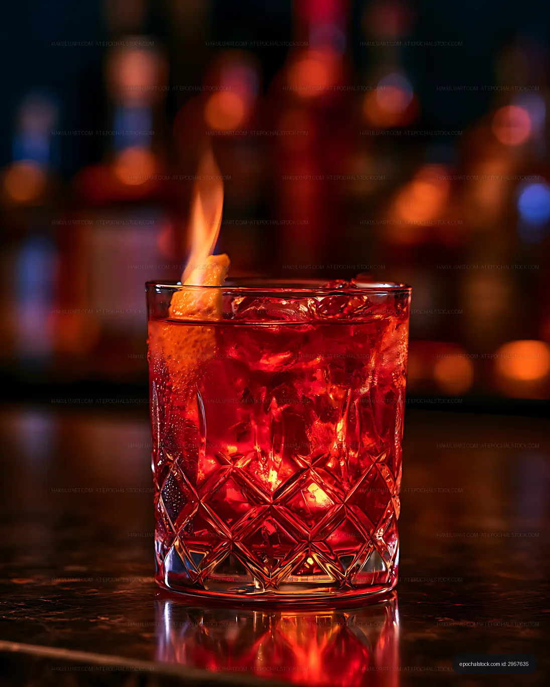 Glowing red cocktail in a patterned glass