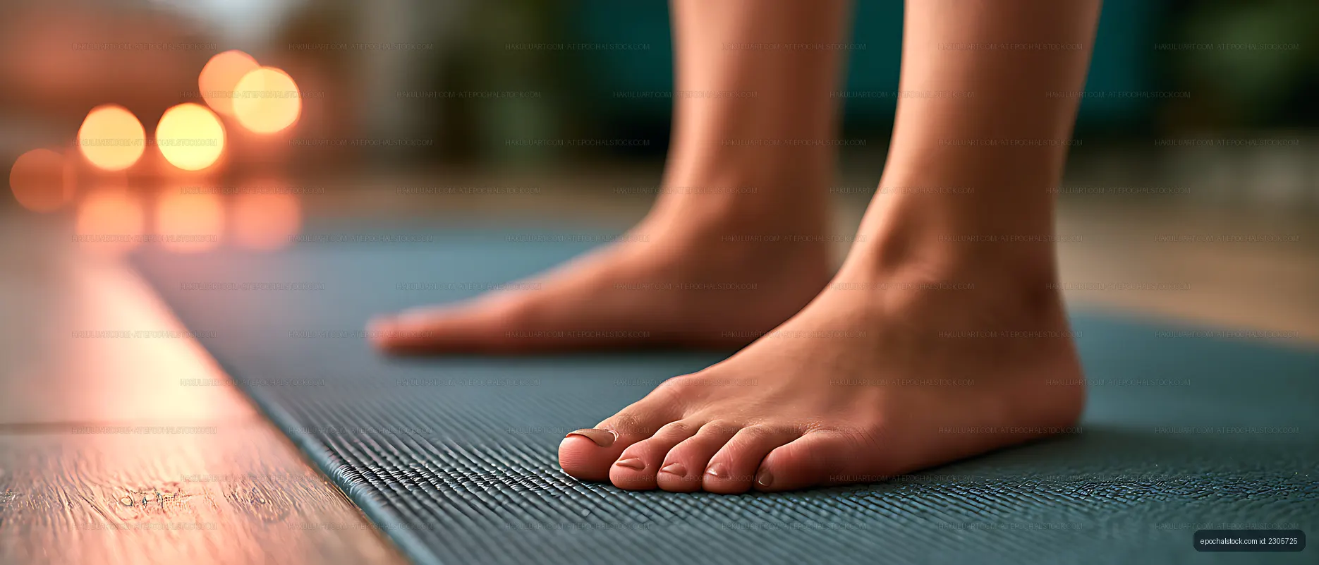 Bare feet positioned on a textured fitness mat