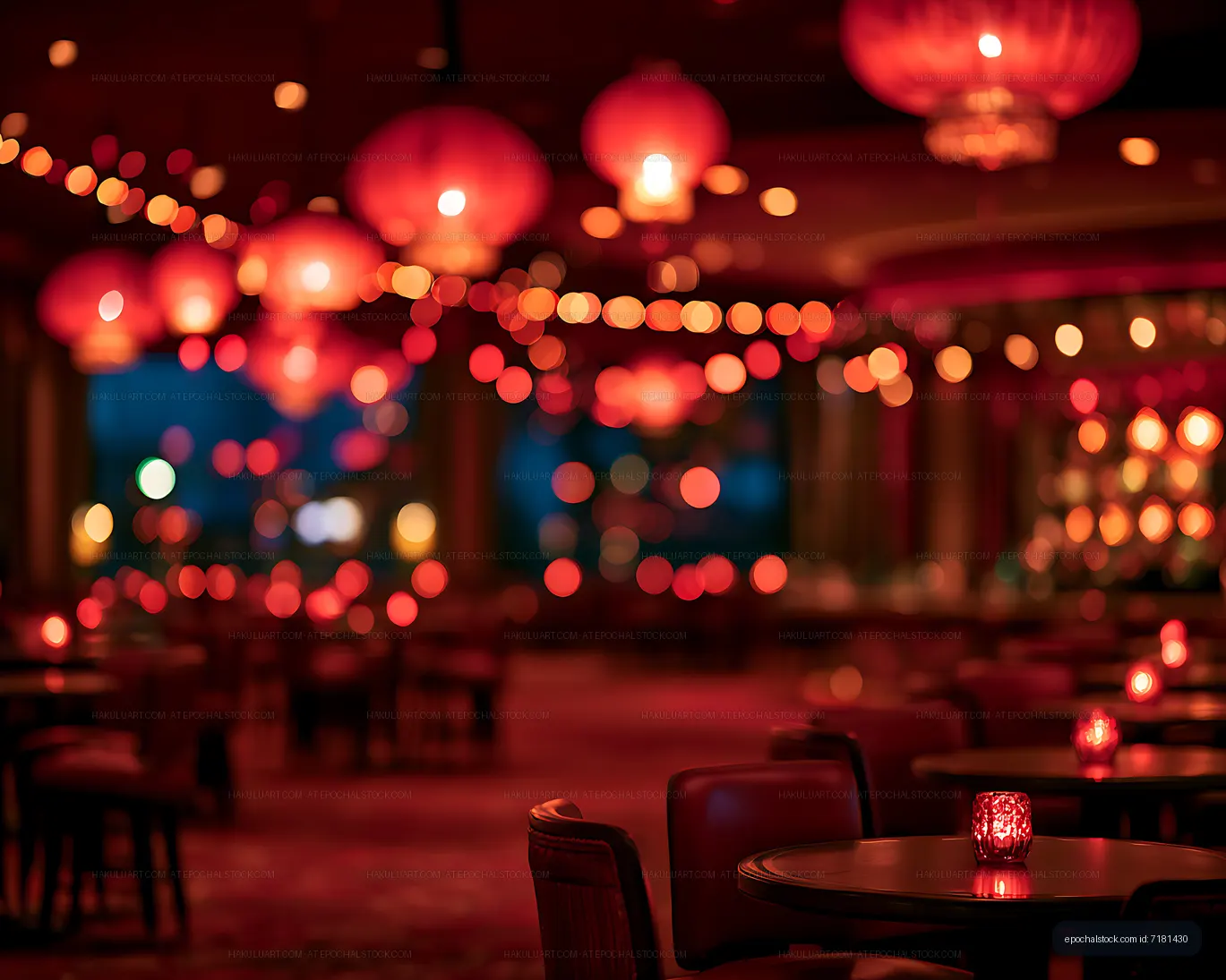 Red lanterns and candlelit tables in a dim lounge