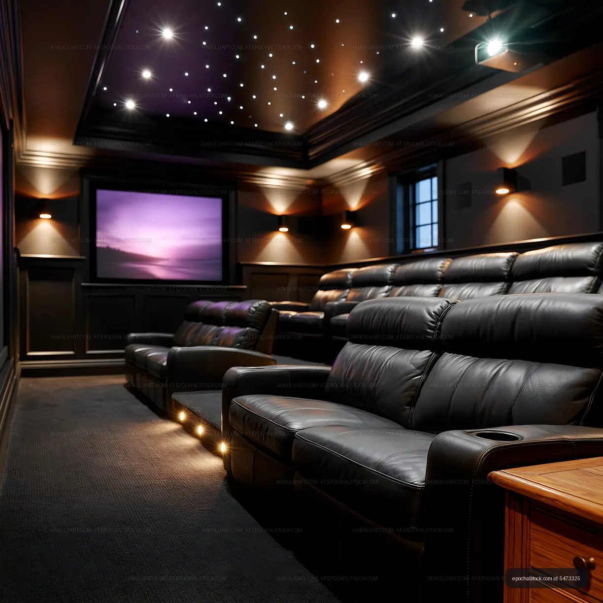 Modern luxury theater room with illuminated screen and seats