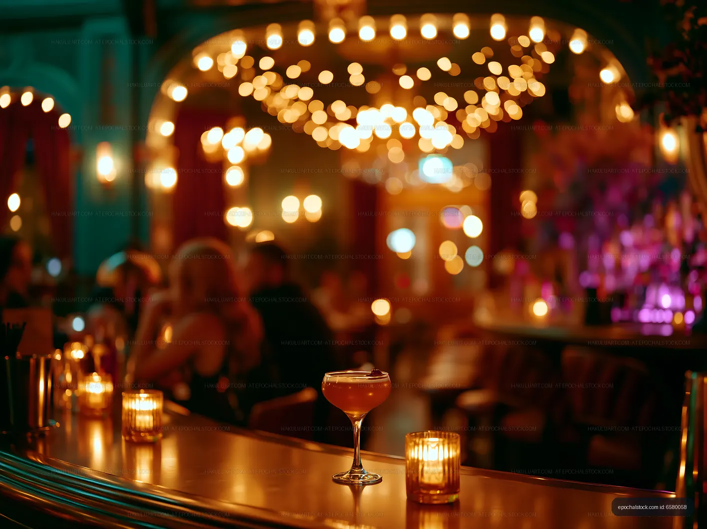 Cocktail at a bar with lights in the background