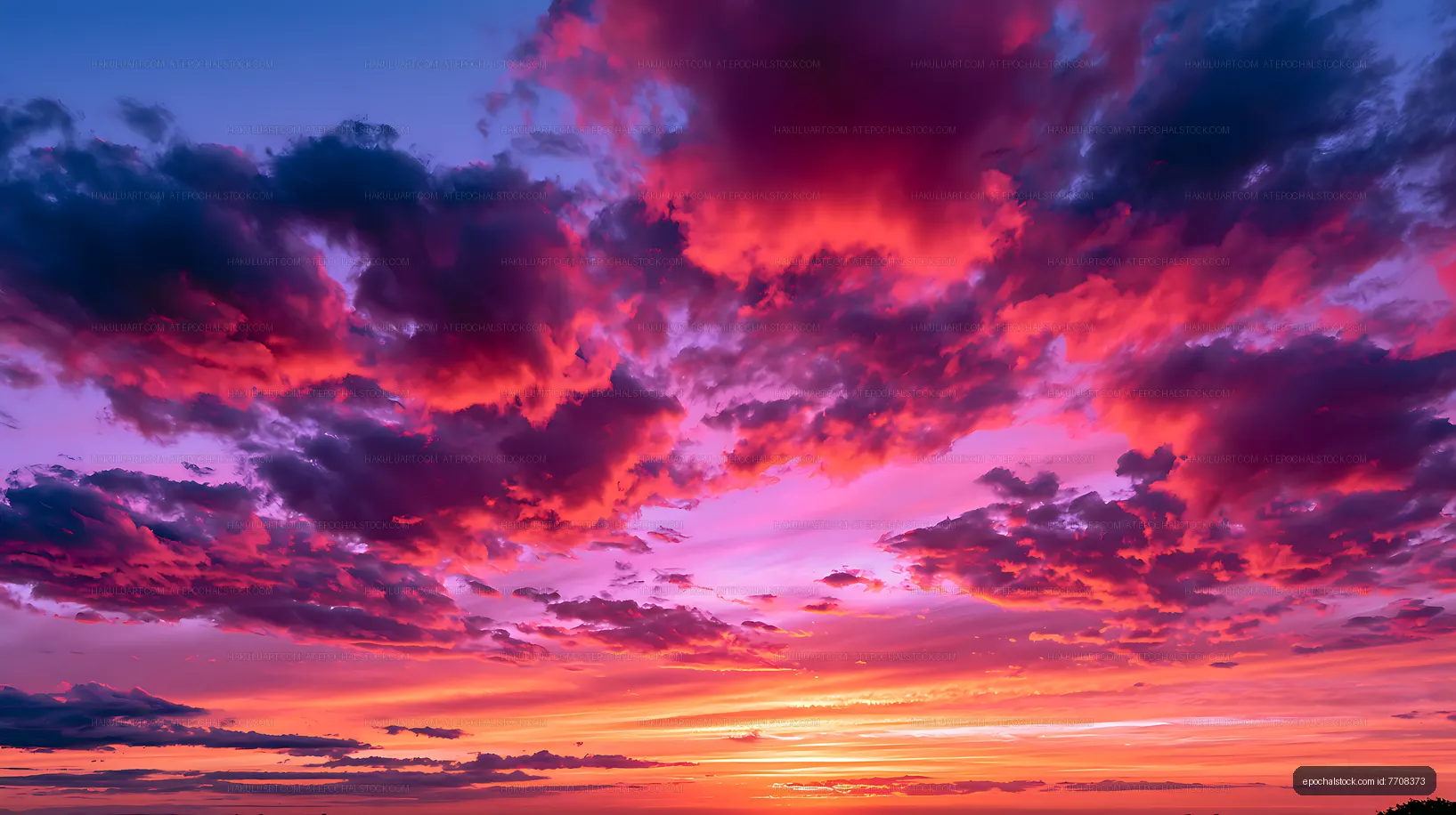 Colorful dramatic sunset sky with layered clouds