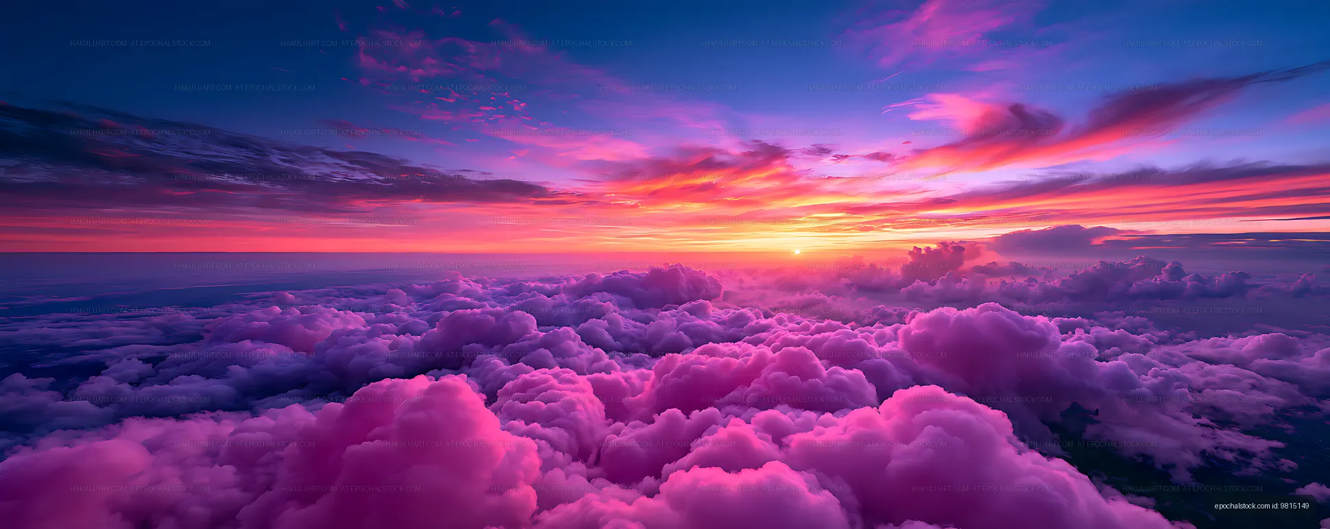 Dreamlike pink and purple clouds at sunset
