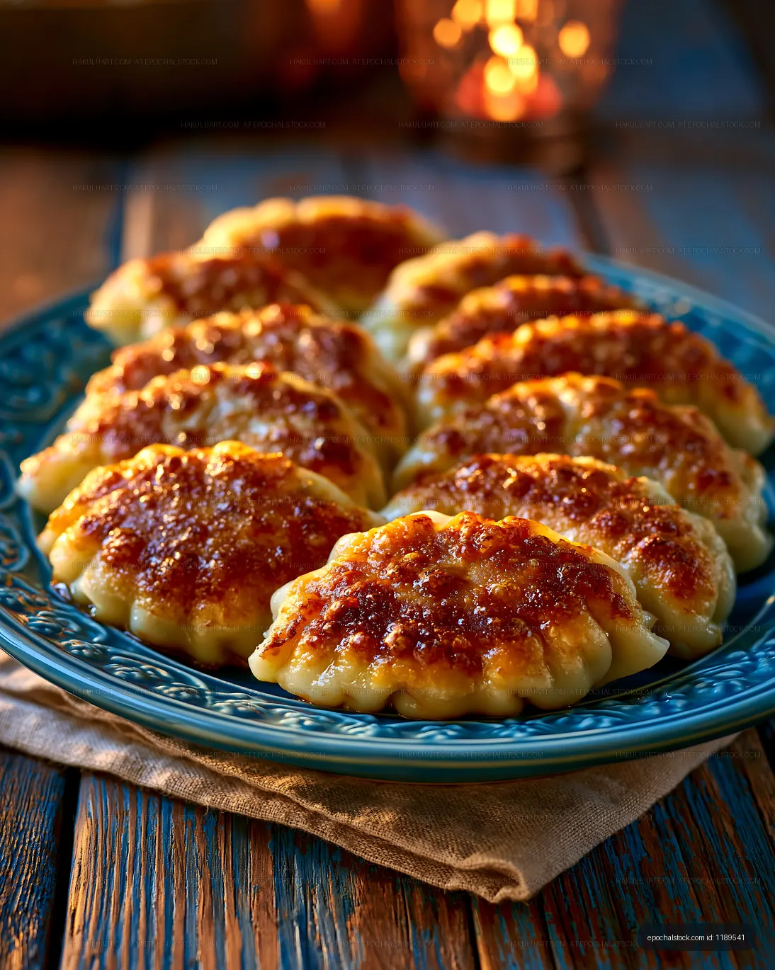 Close-up of glossy pastries on a blue serving plate