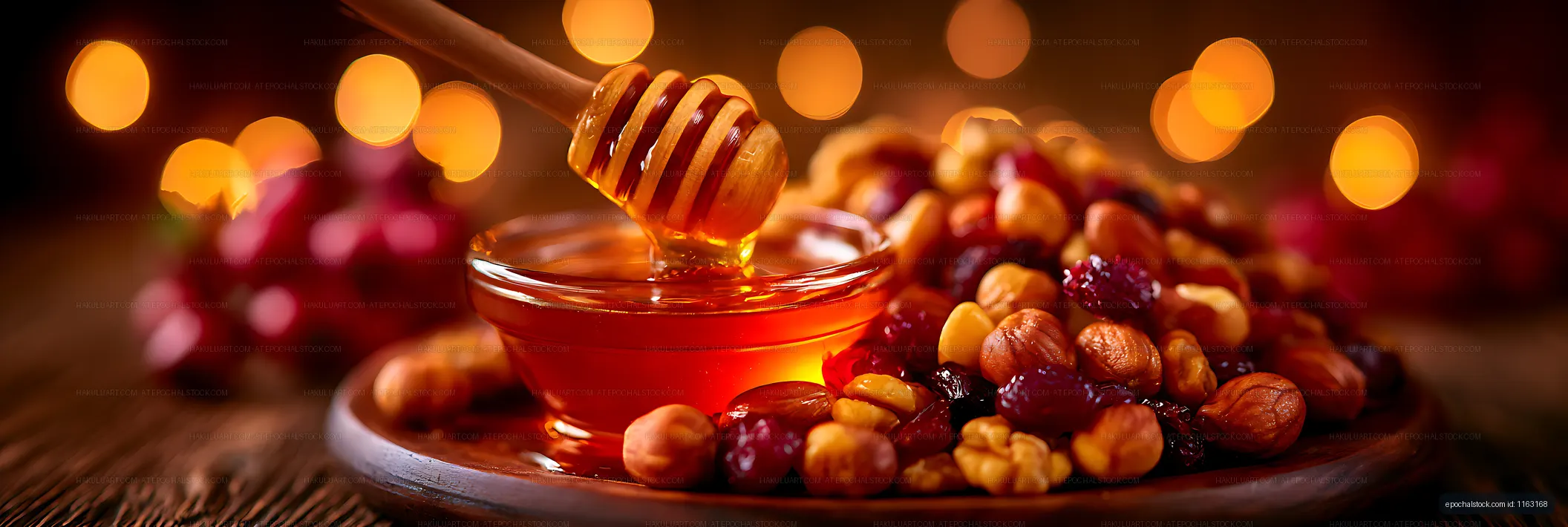 Honey dipper and honey bowl with assorted nuts and dried fruit