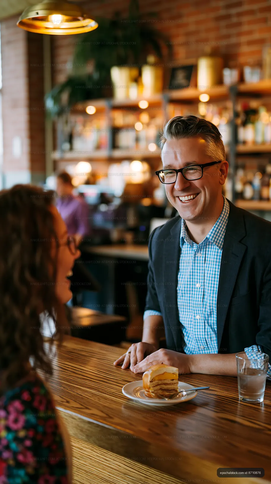 Smiling man and woman in a cozy cafe setting