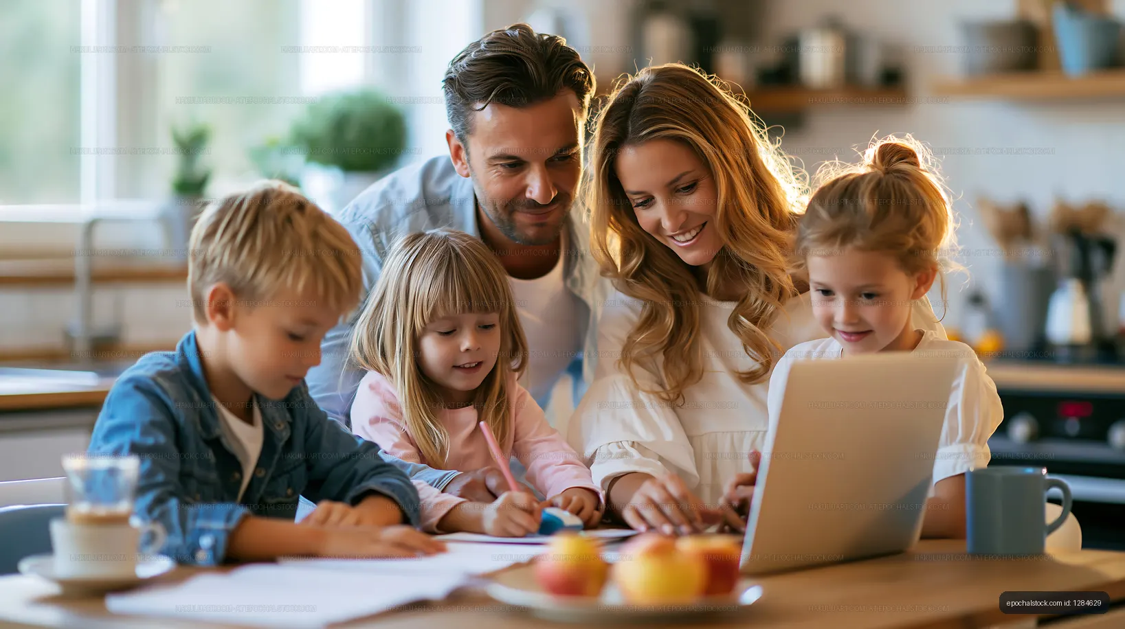 Family learning together around a kitchen table