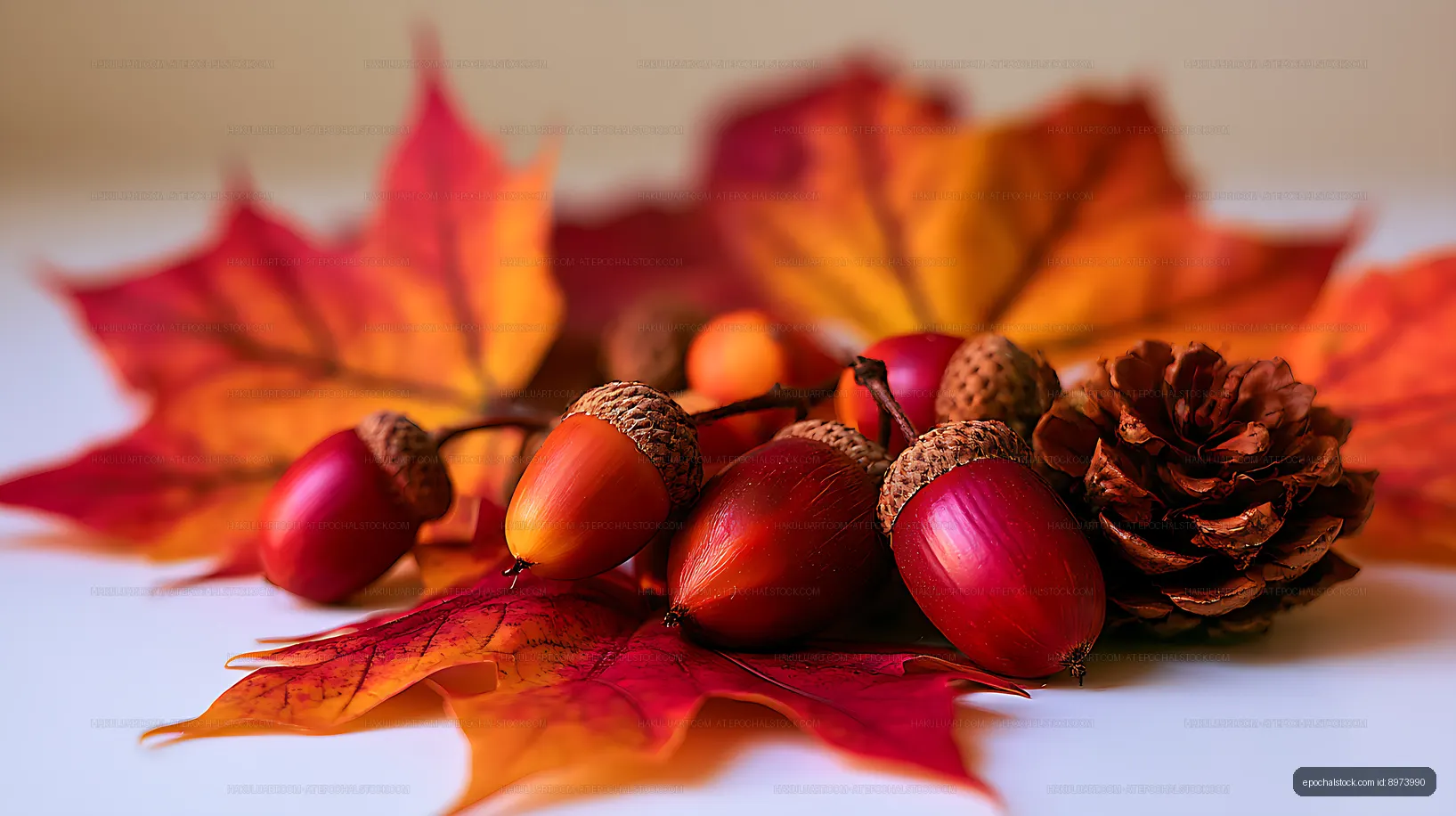Autumn leaves with acorns, berries, and dried flower