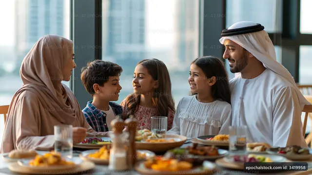 Family enjoying meal together in modern restaurant