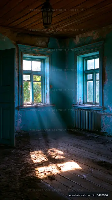 Light beams in an empty room with blue walls and wooden floor