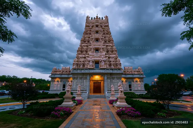 Ancient temple structure under stormy sky during evening hours