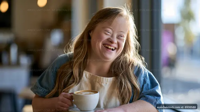 Woman enjoying coffee in a cafe with a warm smile