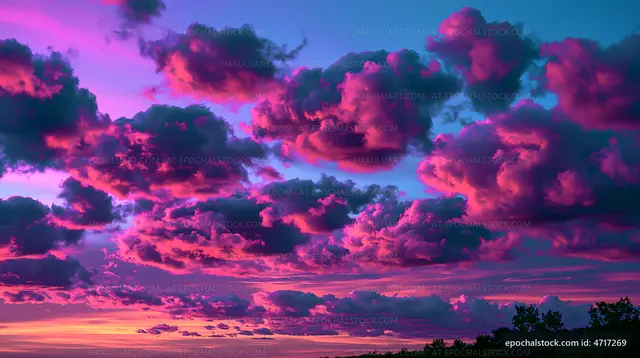 Colorful sunset clouds fill the sky at dusk
