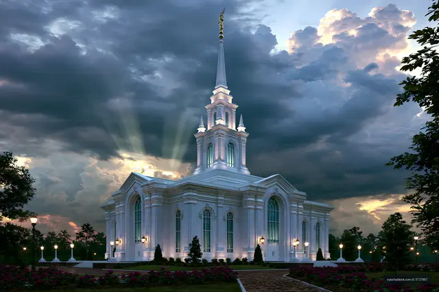 Church building under dramatic sky at sunset