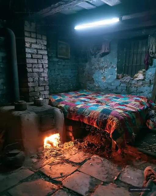 Warm space with a bed and an old stove in a rustic room