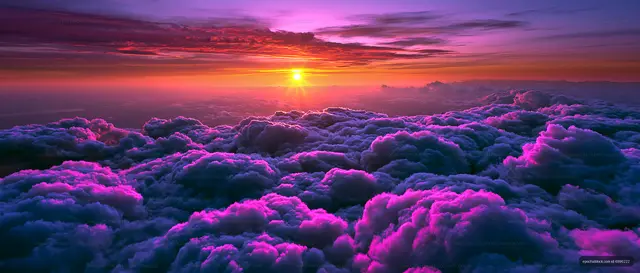 Colorful sunset over fluffy clouds in the sky