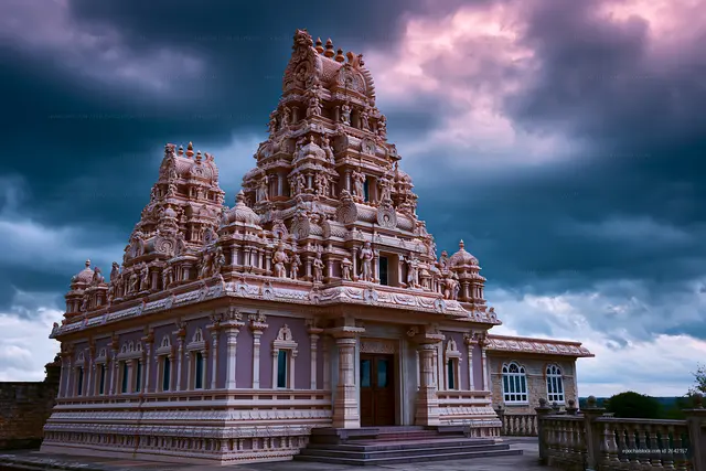 Temple with intricate architecture under a stormy sky