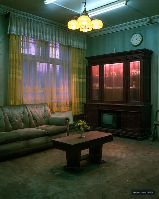 Living room with vintage furniture and soft lighting at dusk
