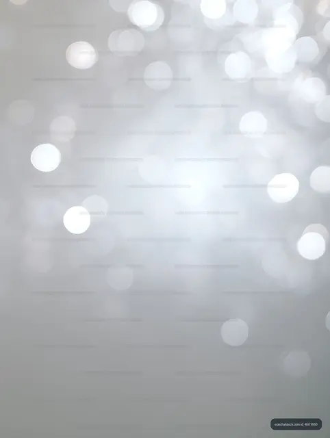 Soft glowing bokeh circles fading across a gray background