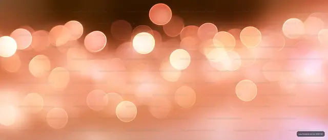 Abstract peach and coral glowing bokeh