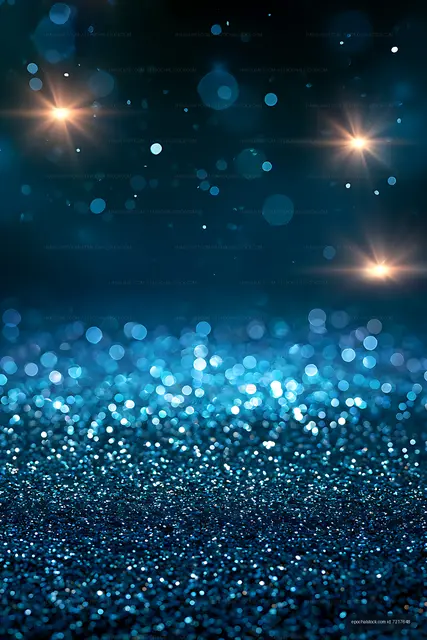 Blue glittering bokeh background with radiant lights