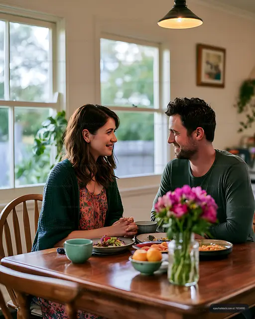 Two people talking over breakfast in a bright home