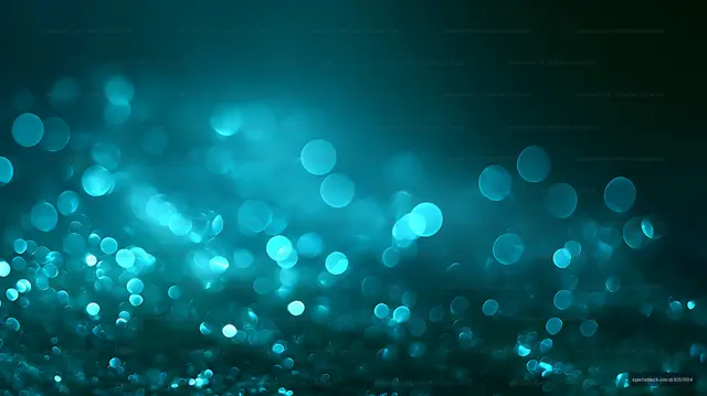 Turquoise cyan bokeh lights on dark teal