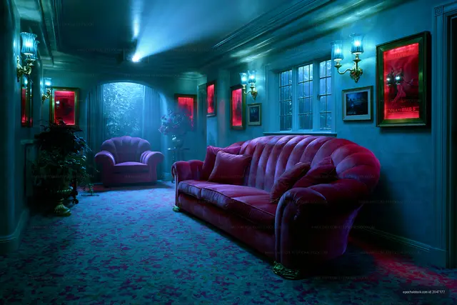 Ornate lounge interior with dramatic colored lighting