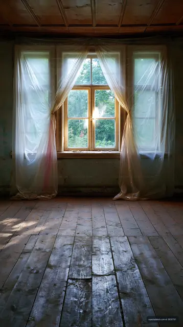 Weathered Room with Wooden Window and Draped Plastic